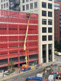 AFI boom lift hire for maintenance works on the outside of a car park