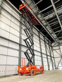 Dingli 22m Scissor Lift Hire equipment being used for indoor work
